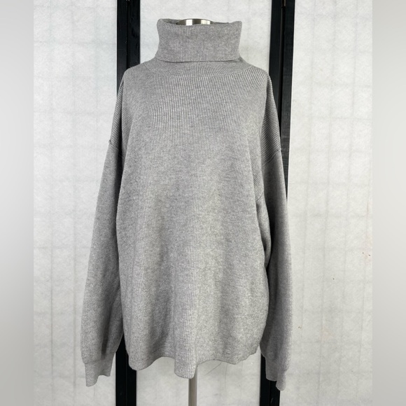 Free People Softly Structured Sweater in a gray.